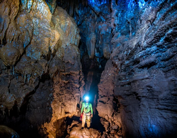 Caving in Slovenia: Learning to Trust the Dark